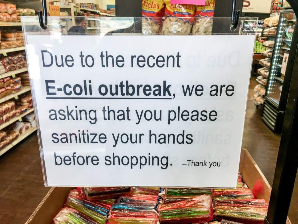 Trent Nelson  |  The Salt Lake Tribune
A sign at the entrance to Bee's Marketplace in Centennial Park, Ariz., asks customers to take precautions after incidents of e-coli in neighboring Hildale, Saturday July 15, 2017.
