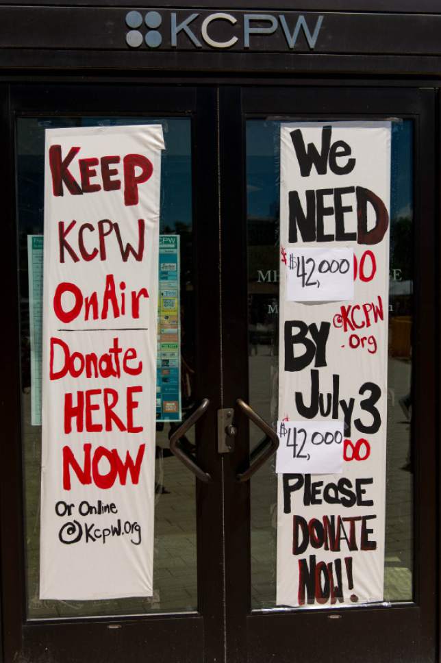 Trent Nelson  |  The Salt Lake Tribune
A sign on the offices of KCPW announces a need for donations to keep the radio station on the air, in Salt Lake City, Saturday June 28, 2014.