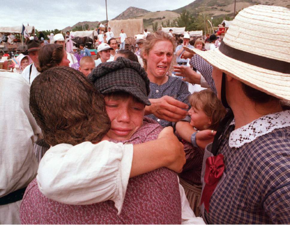 Rick Egan  | Tribune file photo 

Ben Sorensen gets a hug as Wendy Westergard prepares to hug Wendy Sorensen.