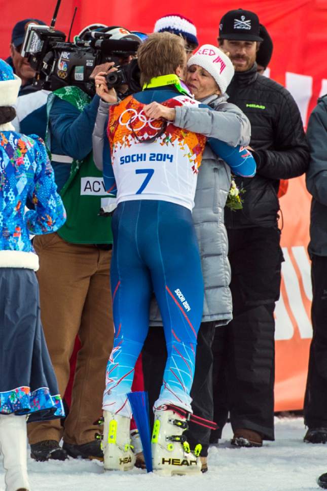 KRASNAYA POLYANA, RUSSIA  - JANUARY 19:
Ted Ligety, of Park City, hugs his mom Cyndi Sharp after winning the Men's Giant Slalom at Rosa Khutor Alpine Center during the 2014 Sochi Olympics Wednesday February 19, 2014. Ligety won the gold medal with a cumulative time of 2:45.29.
(Photo by Chris Detrick/The Salt Lake Tribune)