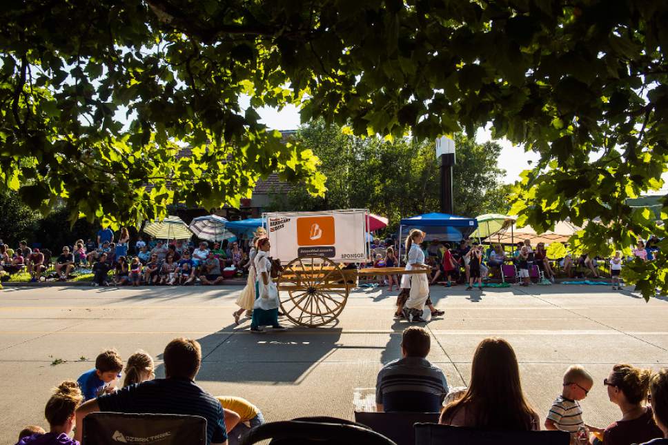 Chris Detrick  |  The Salt Lake Tribune
Participates walk with a handcart during the 65th annual Bountiful Handcart Days Grand Parade Friday, July 21, 2017.