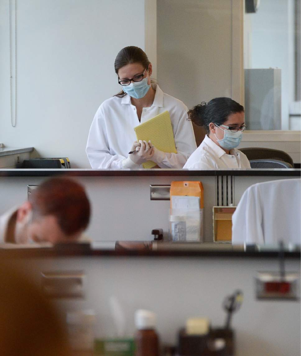 Francisco Kjolseth | The Salt Lake Tribune
Technicians process rape kits in the screening area of the DPS Crime Lab in Taylorsville. The Sexual Assault Kit Initiative (SAKI) group and the new information line were introduced for the first time to the public at a press conference on July 19, 2017.