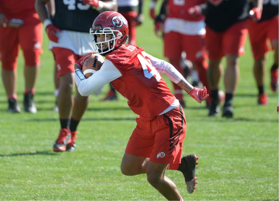 Scott Sommerdorf   |  The Salt Lake Tribune  
Utah WR Samson Nacua spins after a catch during the first day of Utah fall football camp, Friday, July 28, 2017.