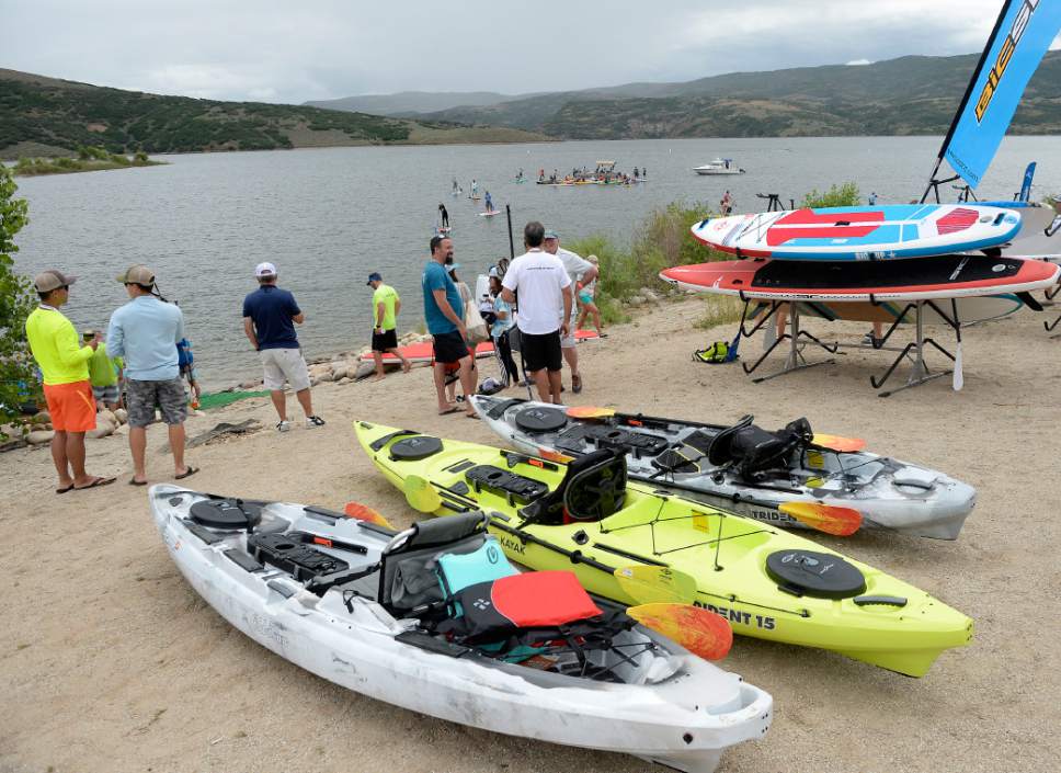 Al Hartmann  |  The Salt Lake Tribune
Participants in Outdoor Retailer try out new watercraft from stand up paddle boards to kayaks at the Demonstration Experience at Jordanelle  State Park Tuesday July 25.  It is the last time the event will be held in Utah.