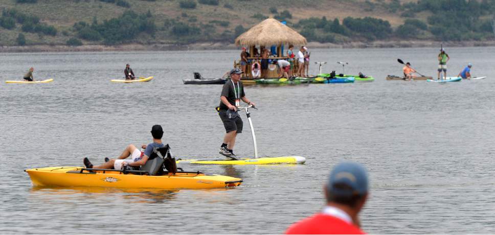 Al Hartmann  |  The Salt Lake Tribune
Participants in Outdoor Retailer try out new watercraft from stand up paddle boards to kayaks at the Demonstration Experience at Jordanelle  State Park Tuesday July 25.  It is the last time the event will be held in Utah.