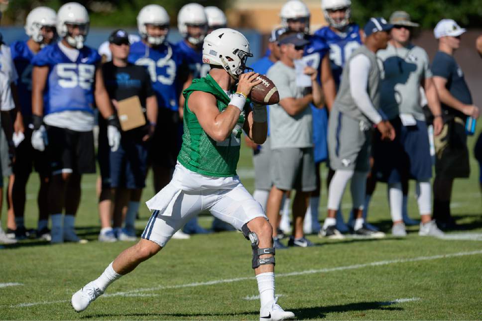 Francisco Kjolseth | The Salt Lake Tribune
BYU football quarterback Tanner Mangum works out with the team as they begin preparations for the season with preseason training camp on Thursday, July 27, 2017, in Provo.