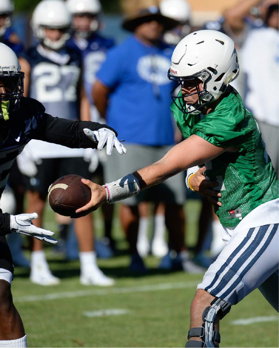 Francisco Kjolseth | The Salt Lake Tribune
BYU football quarterback Tanner Mangum works out with the team as they begin preparations for the season with preseason training camp on Thursday, July 27, 2017, in Provo.