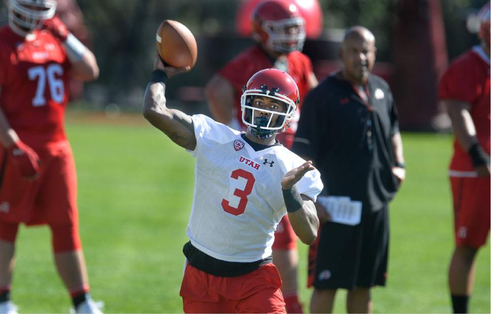 Utah quarterback Troy Williams throws during the first day of NCAA college football practice for the team Friday, July 28, 2017, in Salt Lake City. (Scott Sommerdorf/The Salt Lake Tribune via AP)