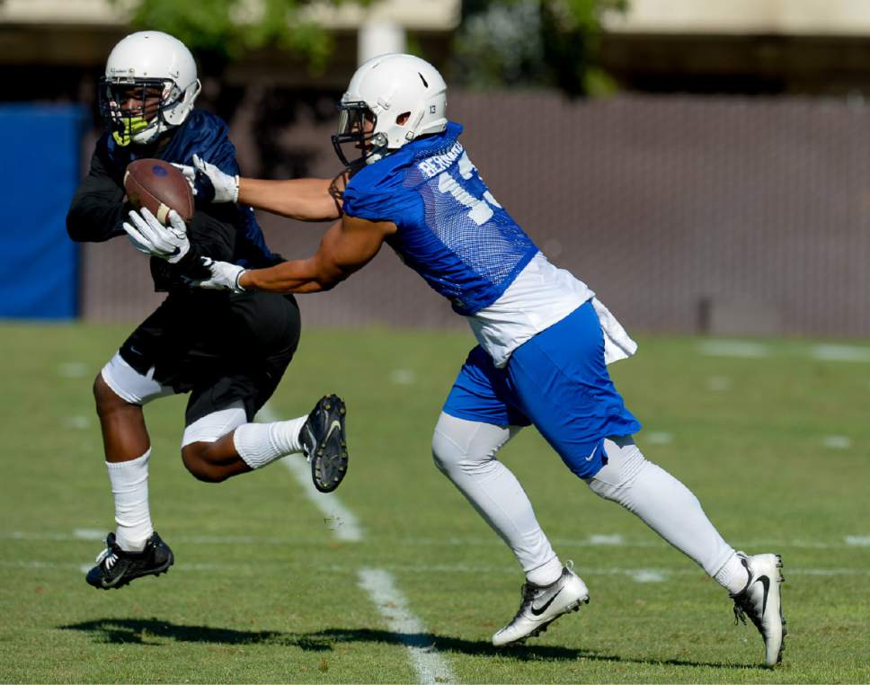 Francisco Kjolseth | The Salt Lake Tribune
BYU football begins preparations for the season as Francis Bernard tries to block a pass intended for Squally Canada during preseason training camp on Thursday, July 27, 2017, in Provo.