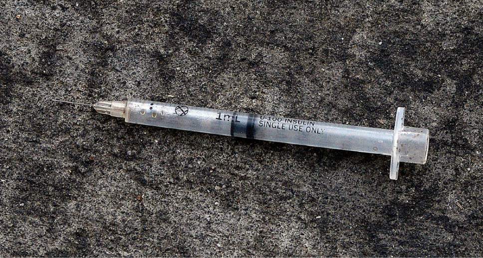 Al Hartmann  |  The Salt Lake Tribune
Used hypodermic needle on sidewalk at 200 S. 550 W. in Salt Lake City Wednesday July 19.