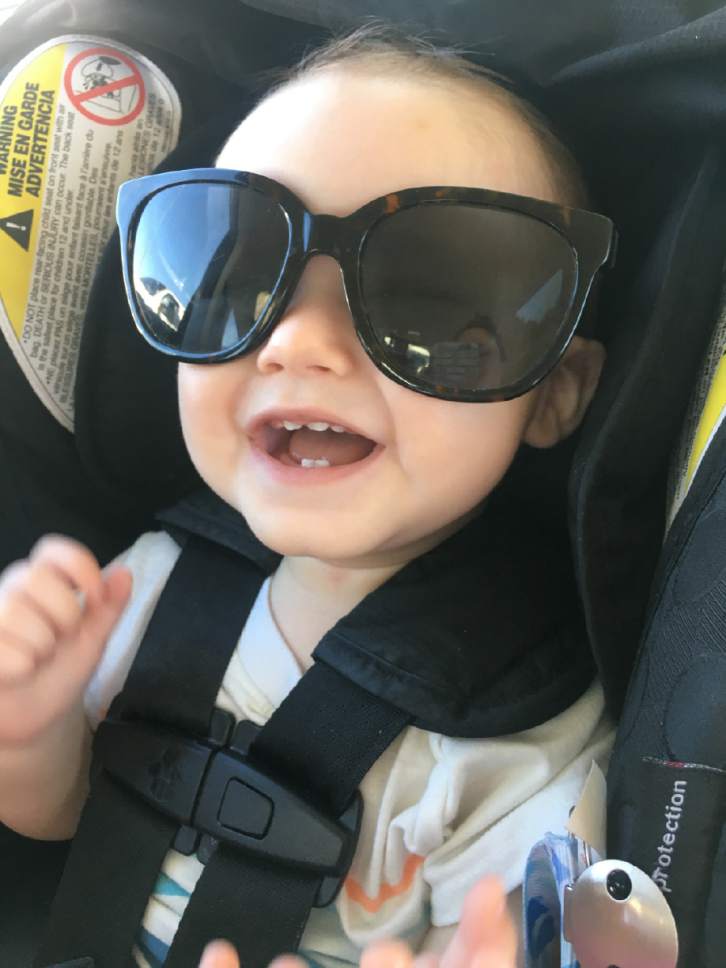 Marina Gomberg  |  The Salt Lake Tribune

Marina Gomberg plays with her son Harvey to pass the time on their recent family road trip.